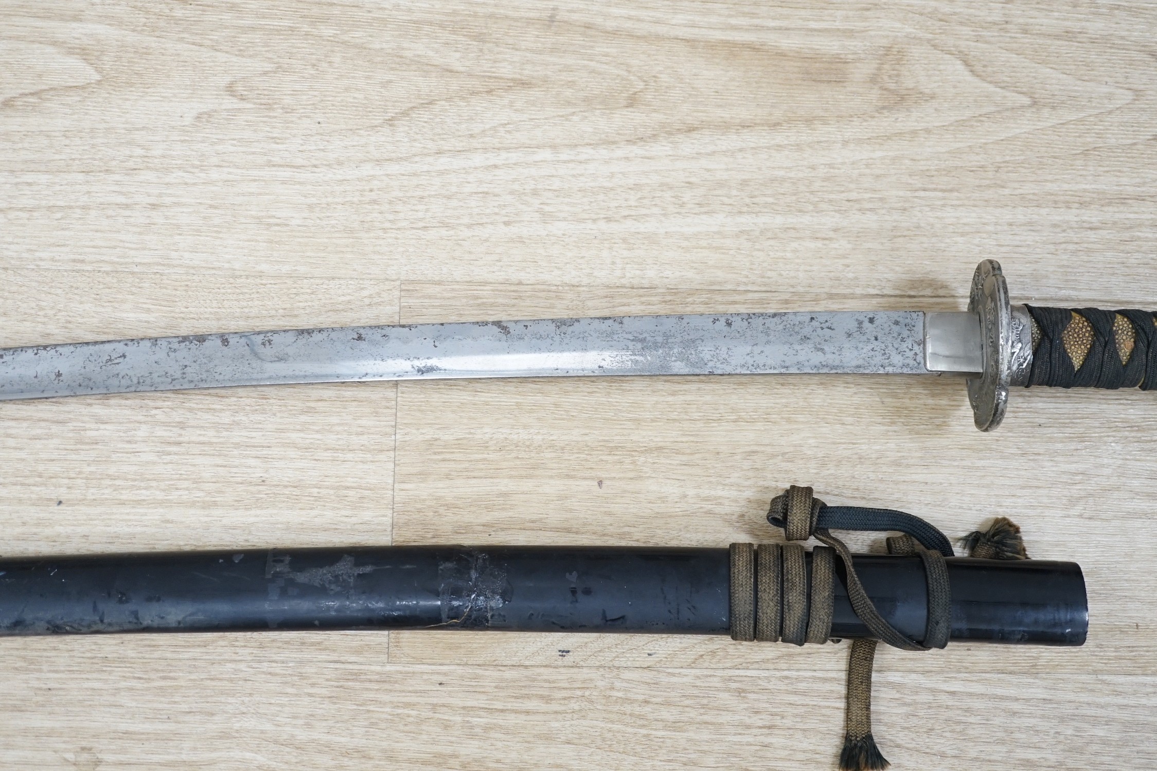 An early 20th century Japanese sword and saya, total length 102cm